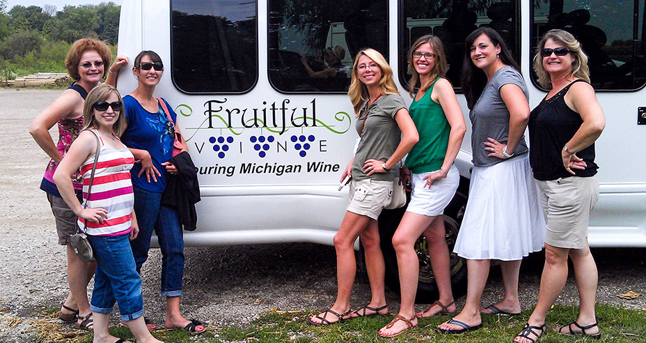 Looking through grape vines at the Hops Noggin van.
